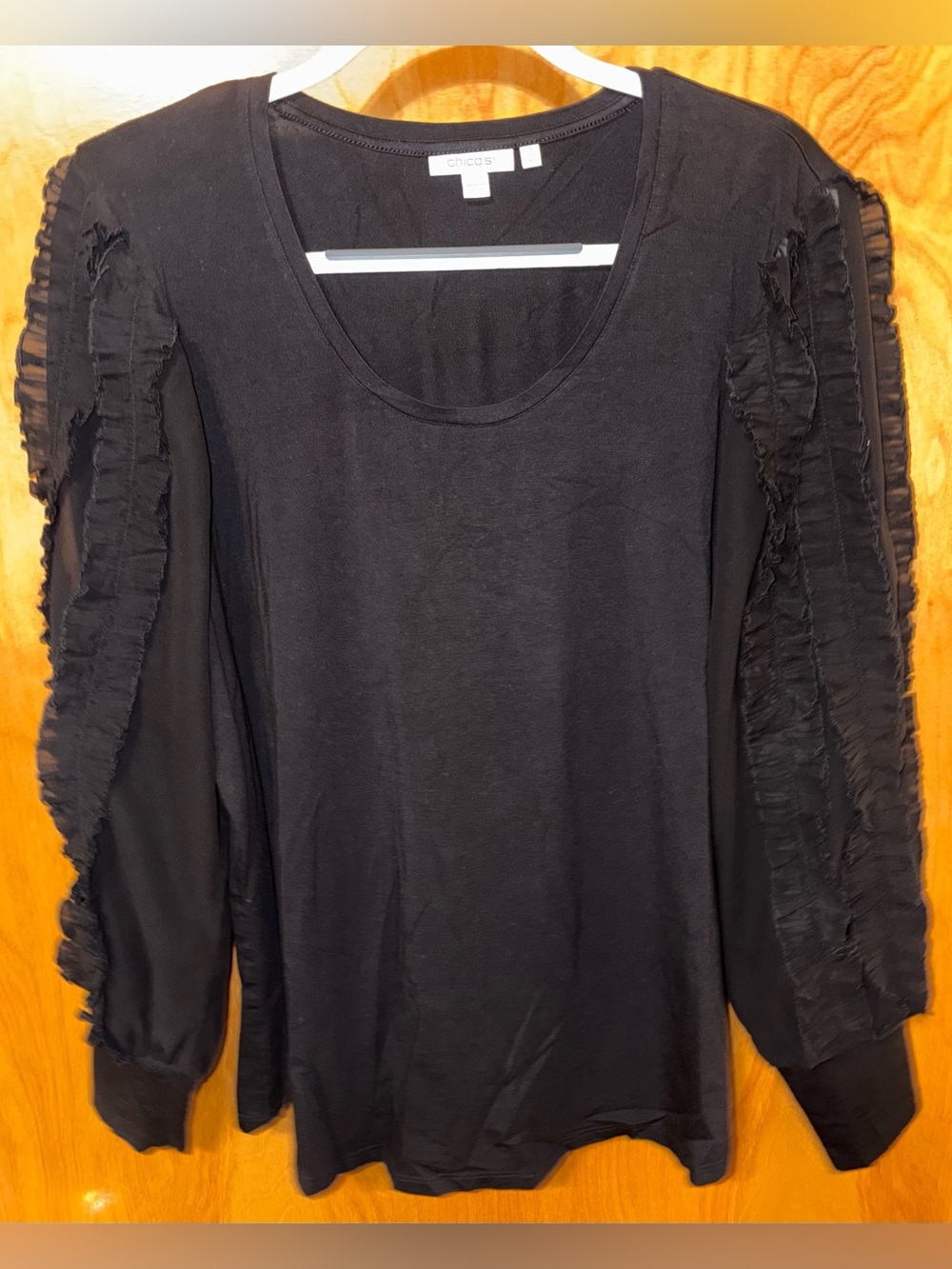 Chico’s black stretch cotton knit top with crinkle chiffon long sleeves Size 2